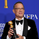 Tom Hanks, preparing for a future career in presenting hot dogs to photographers